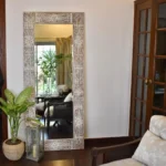 Modern decorative wall mirror designed to enhance home interiors with elegance and style.