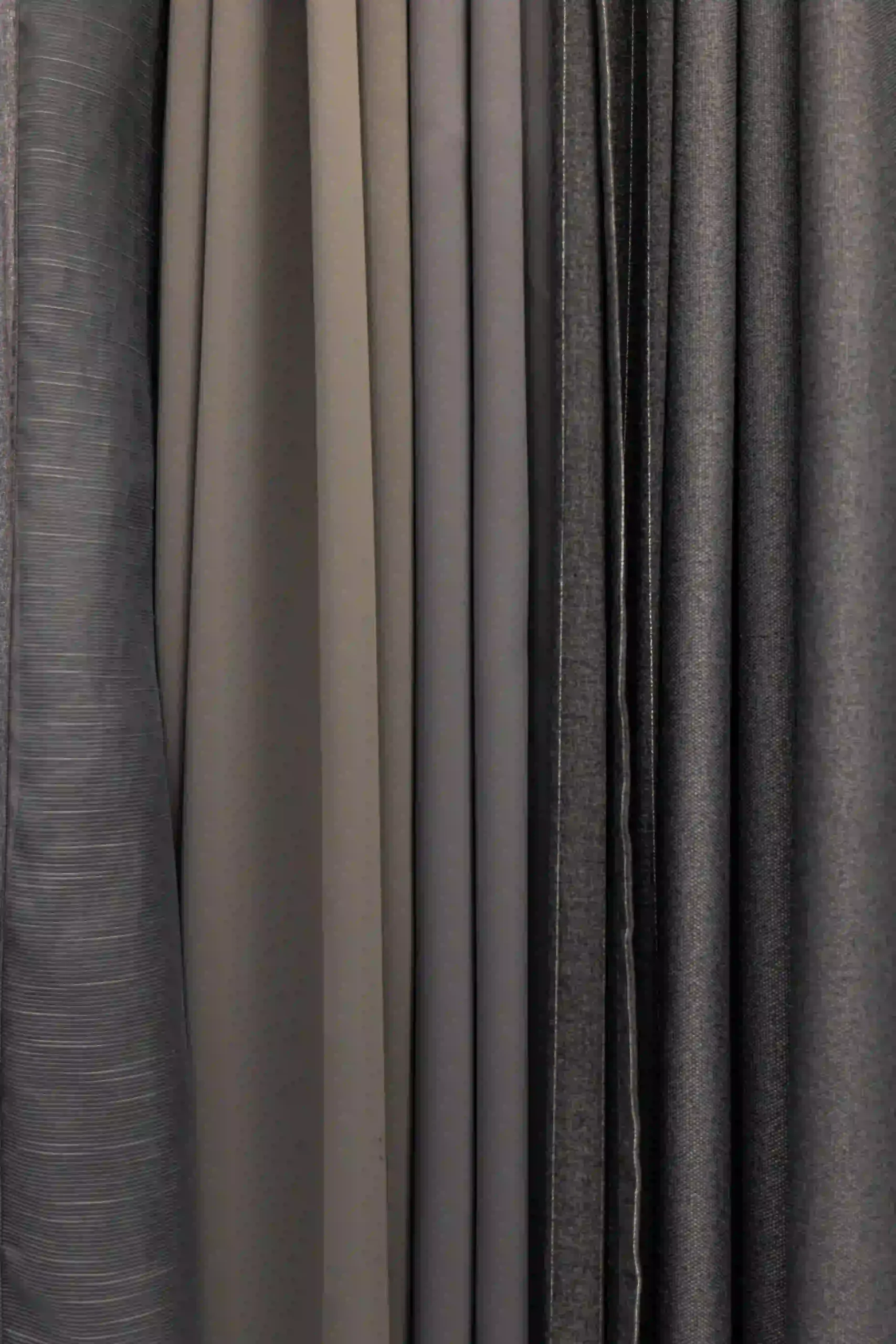 Floor-to-ceiling curtains adding style to a contemporary room