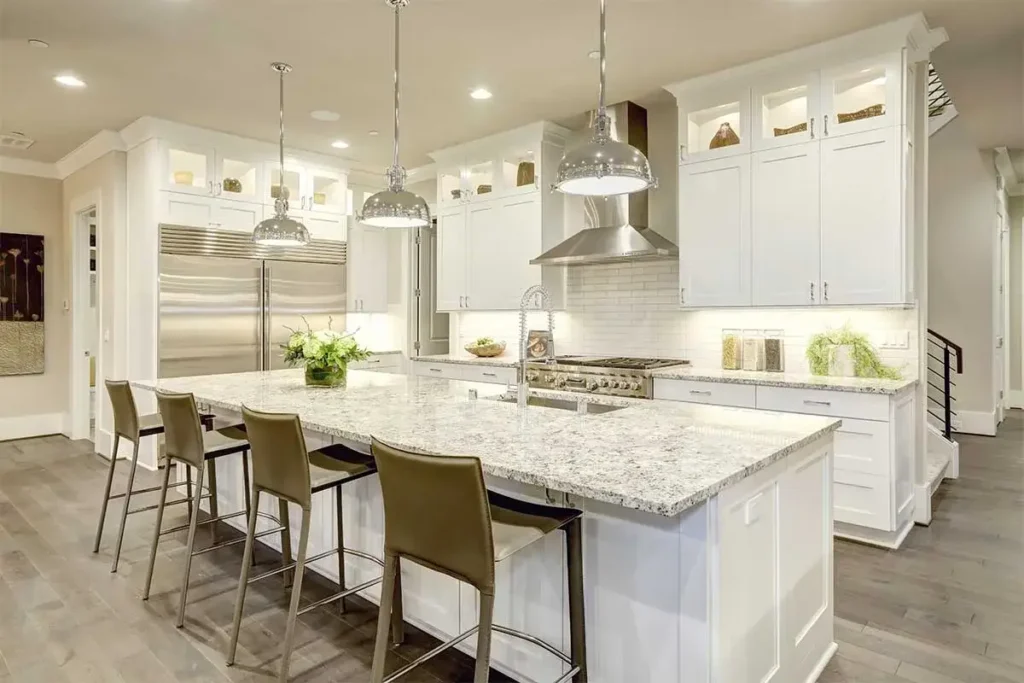 Modern kitchen lighting design featuring pendant lights, recessed ceiling lights, and under-cabinet LEDs creating a bright, stylish, and functional kitchen space.