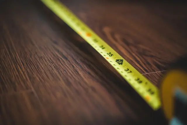 Laminate-flooring-installation-showing-click-lock-plank-system